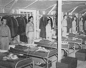 Trainees in barracks during inspection