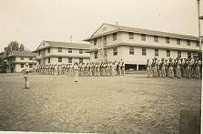 A formation behind the barracks