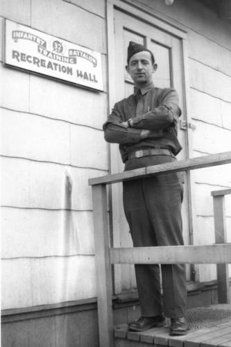 Plotkin in front of the 32nd ITB Recreation Hall at Camp Croft